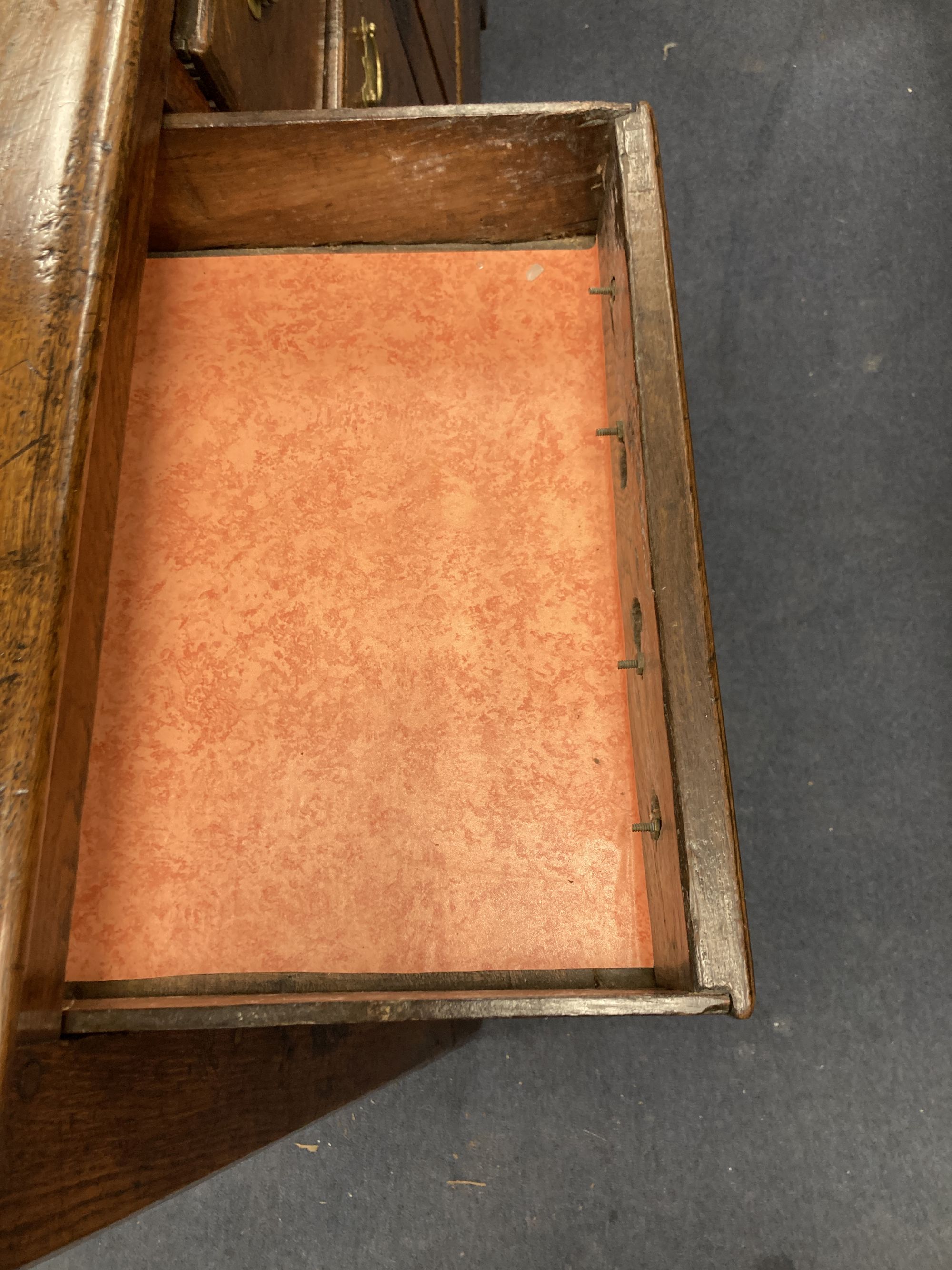 A mid 18th century oak dresser base, length 140cm, depth 46cm, height 86cm